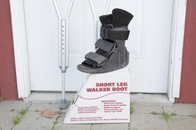 How to Wear a Walking Boot & Use Crutches