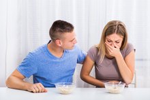 Signs & Symptoms of Food Poisoning From Bad Meat