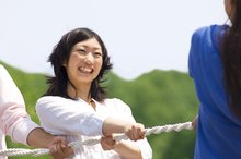 Weight-Loss Games for Groups